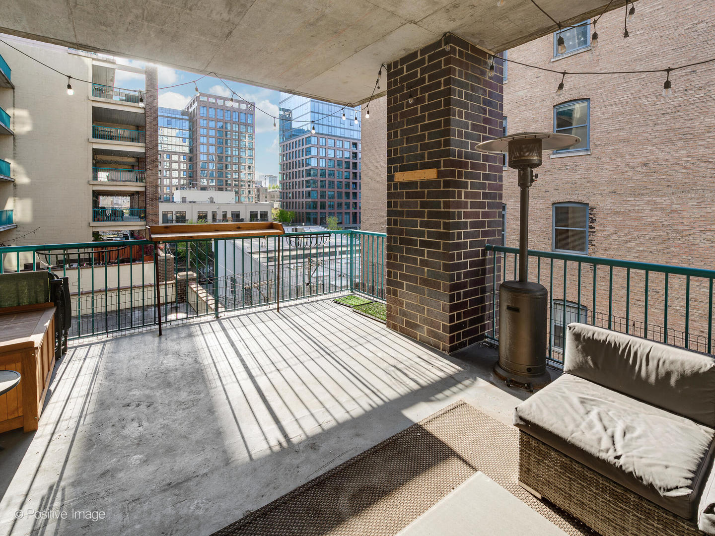 910 West Madison Street, Unit 509 Chicago, IL 60607 - Photo 14 of 14 a balcony with wooden floor