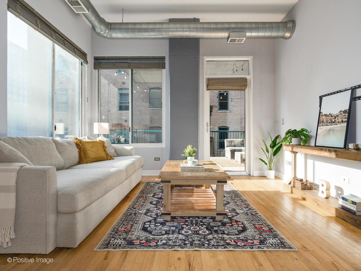 910 West Madison Street, Unit 509 Chicago, IL 60607 - Photo 4 of 14 a living room with furniture and a large window