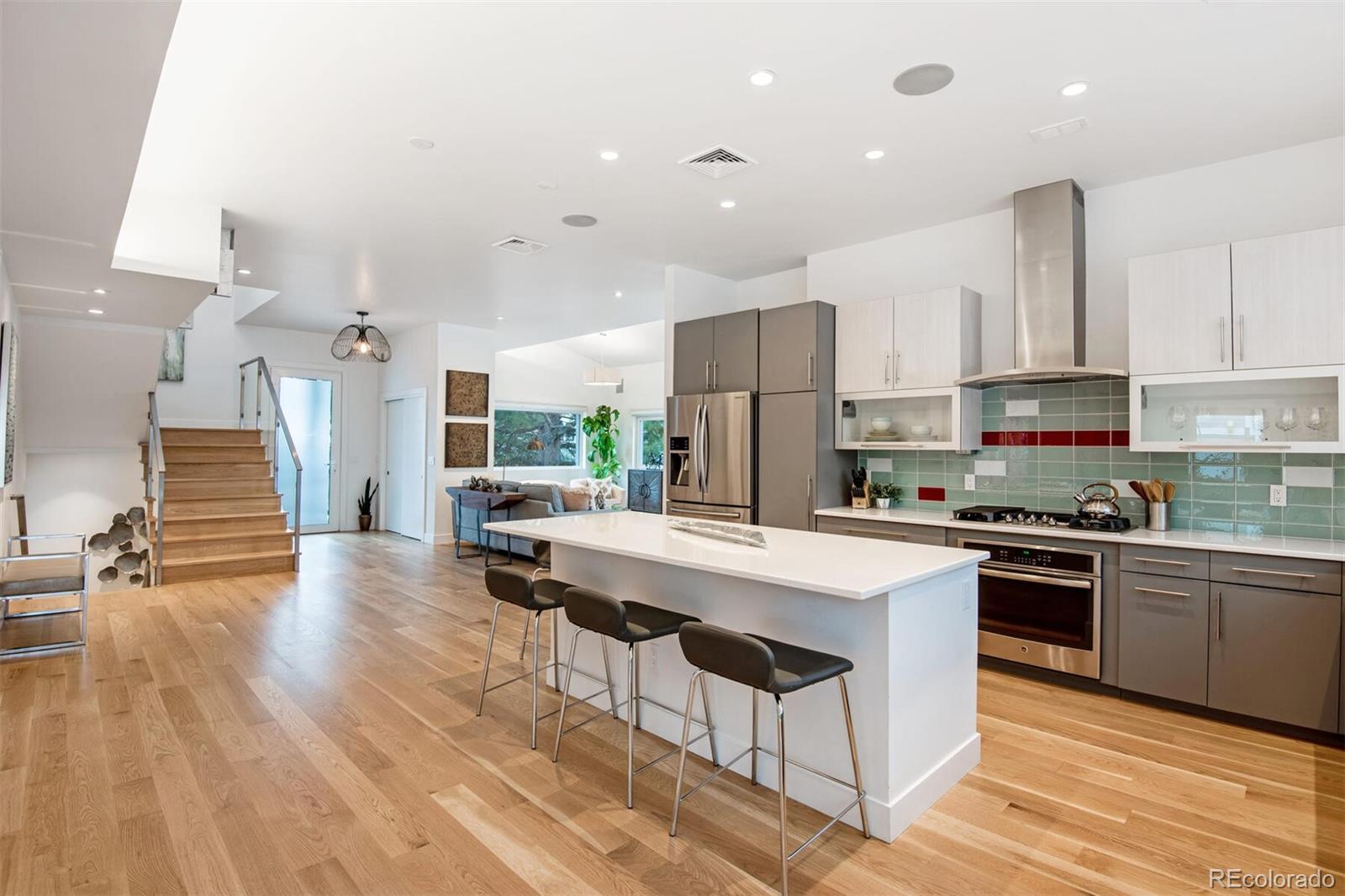 500 Iris Avenue Boulder, CO 80304 - Photo 13 of 39 a kitchen with stainless steel appliances a stove a sink a refrigerator and cabinets