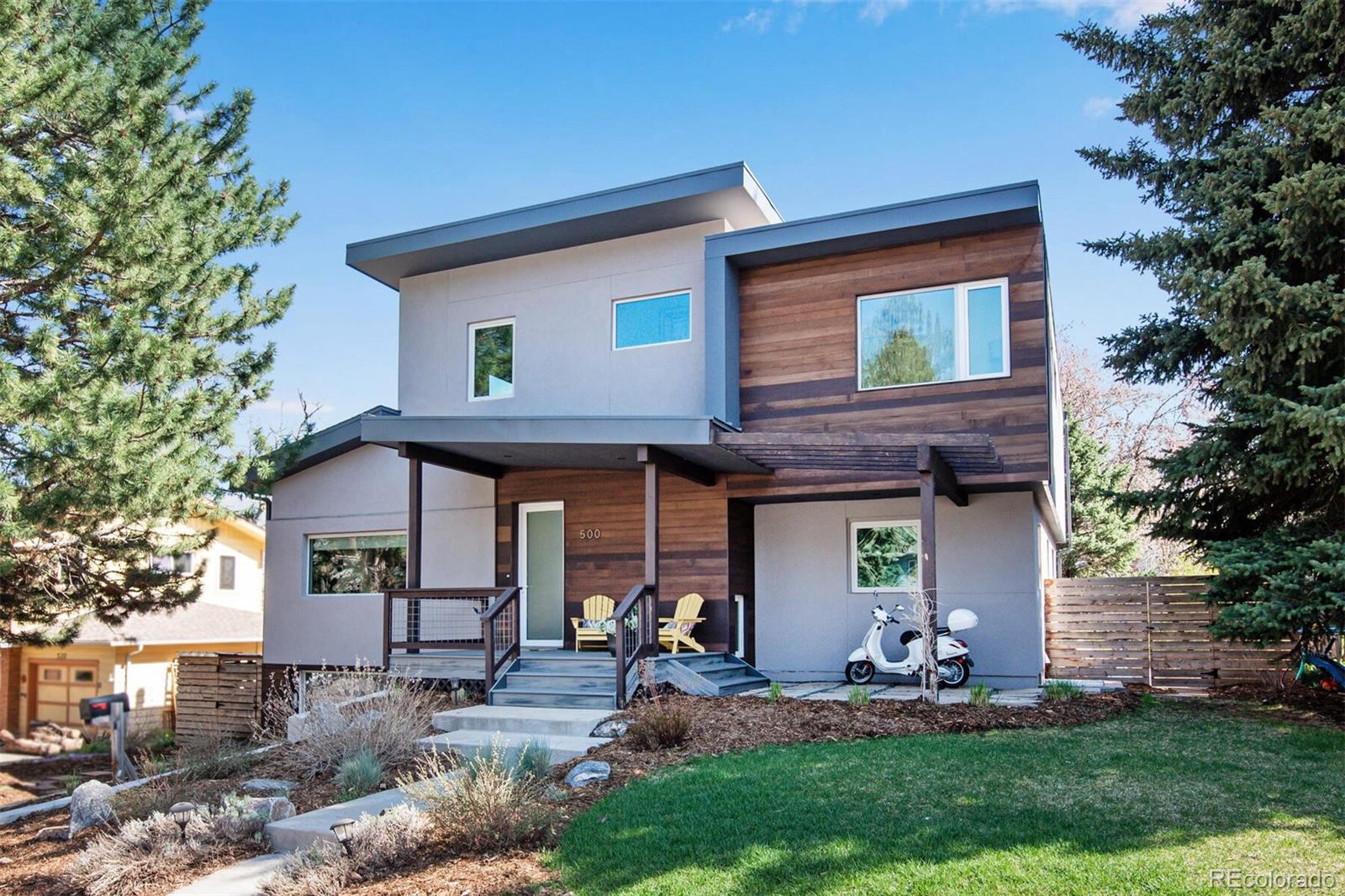 500 Iris Avenue Boulder, CO 80304 - Photo 2 of 39 a view of house with backyard and outdoor seating