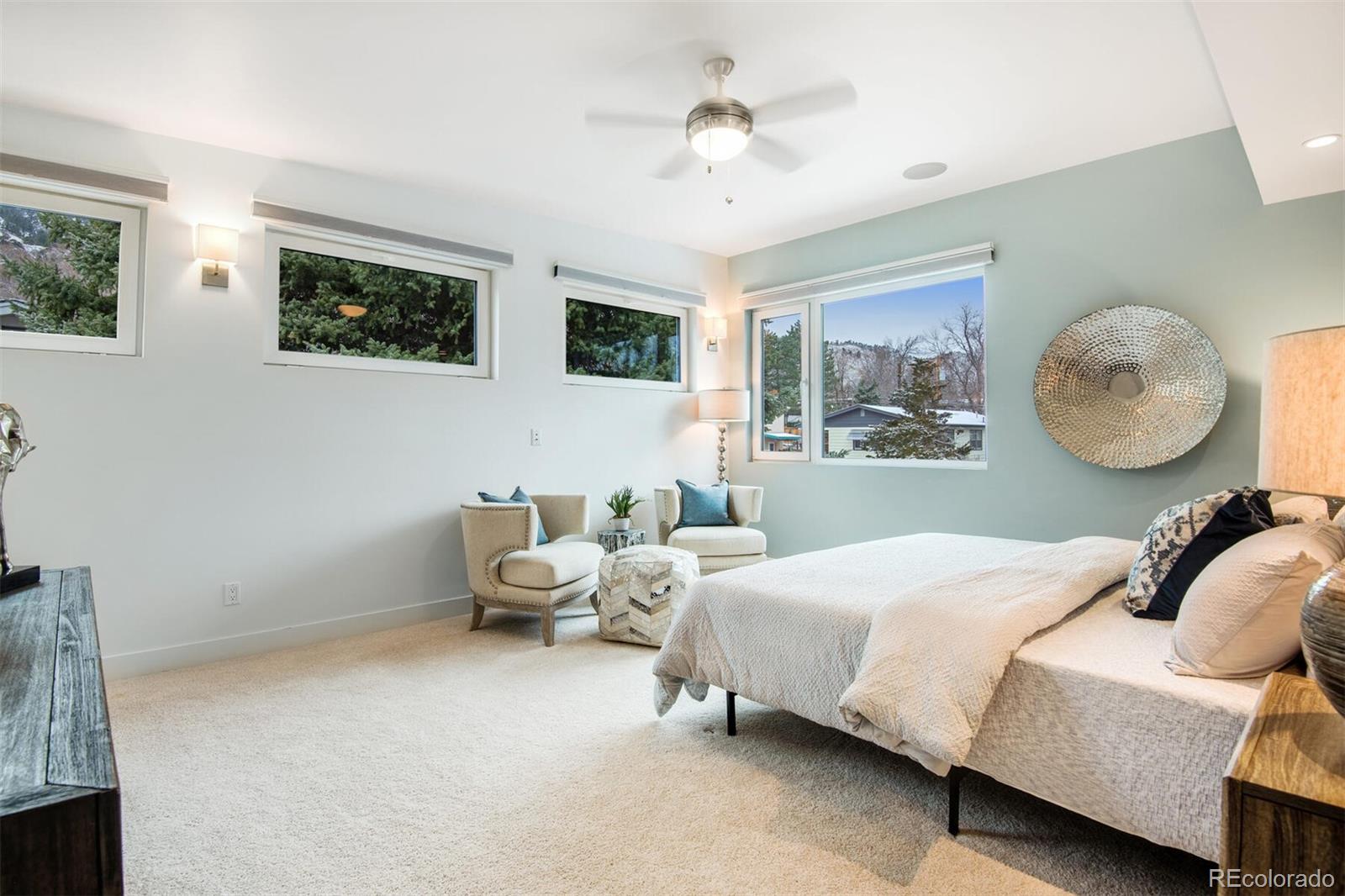500 Iris Avenue Boulder, CO 80304 - Photo 24 of 39 a bedroom with a bed and lamp