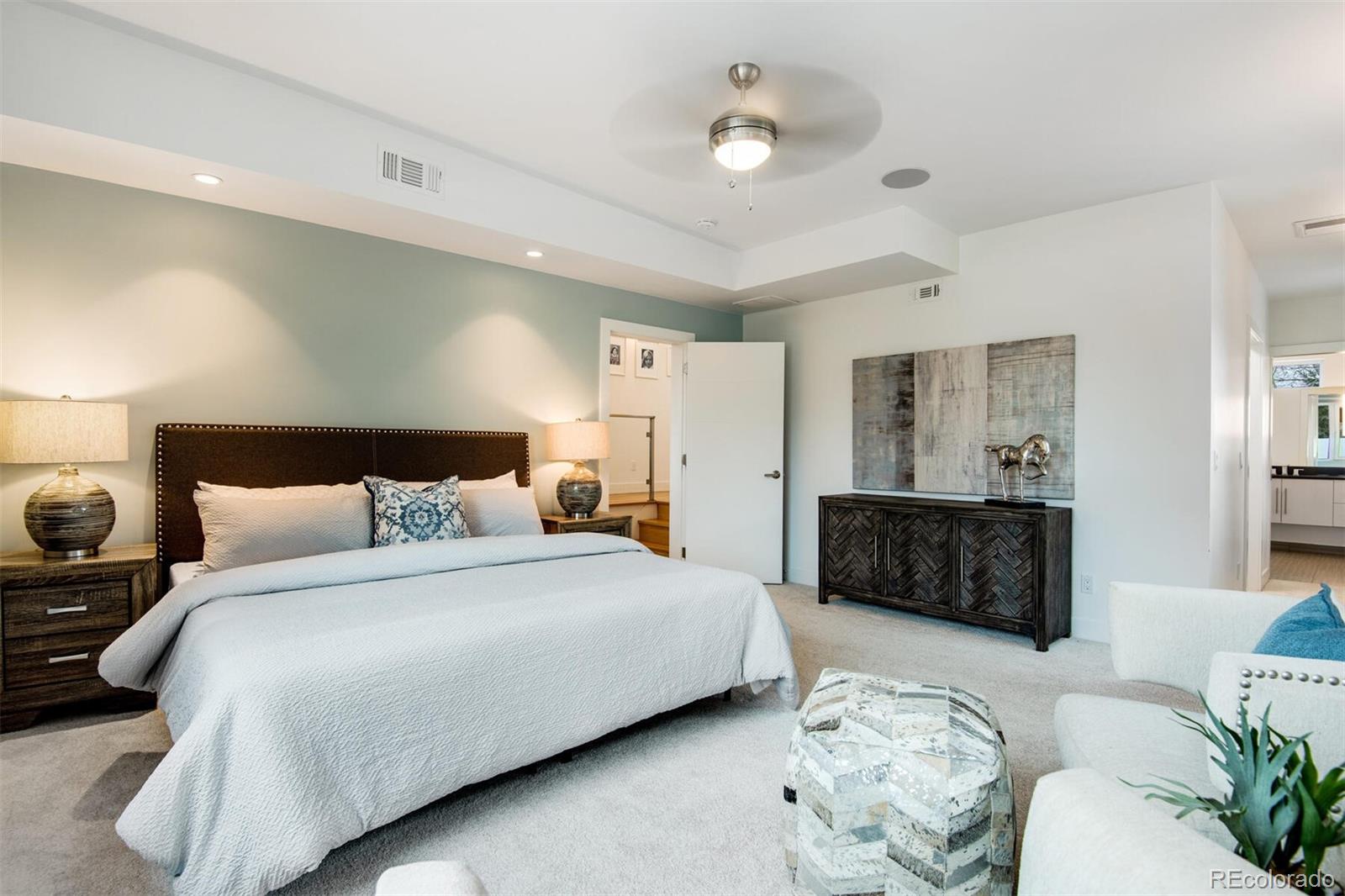 500 Iris Avenue Boulder, CO 80304 - Photo 27 of 39 a bedroom with bed and a couch