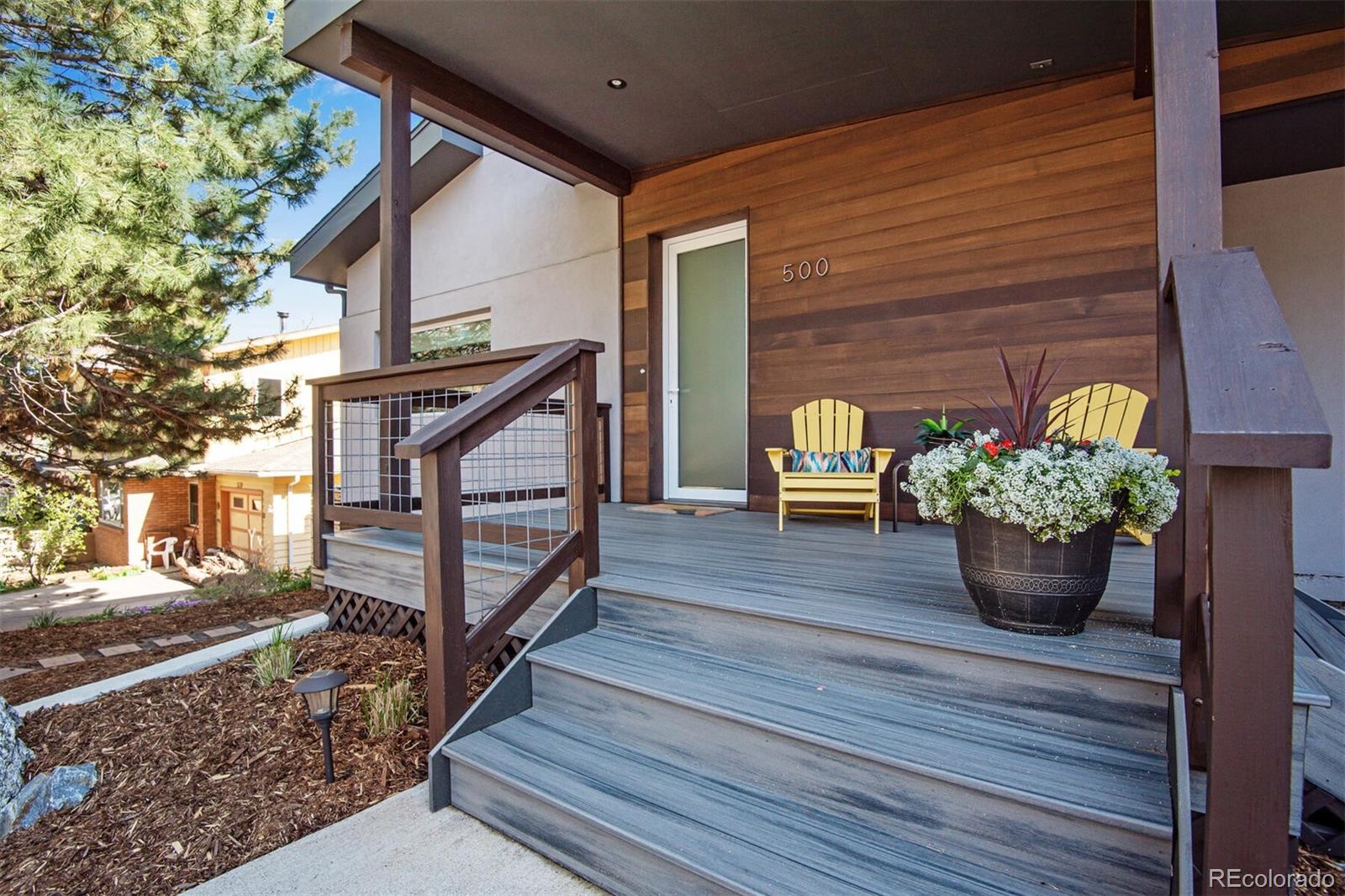 500 Iris Avenue Boulder, CO 80304 - Photo 3 of 39 a view of house with wooden deck and furniture
