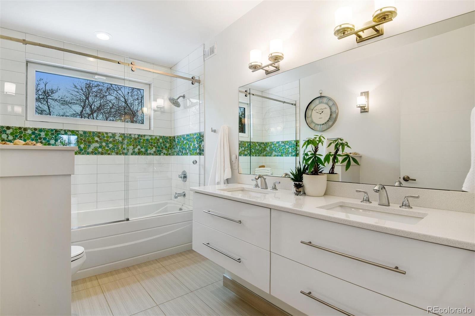 500 Iris Avenue Boulder, CO 80304 - Photo 31 of 39 a bathroom with a double vanity sink and a mirror