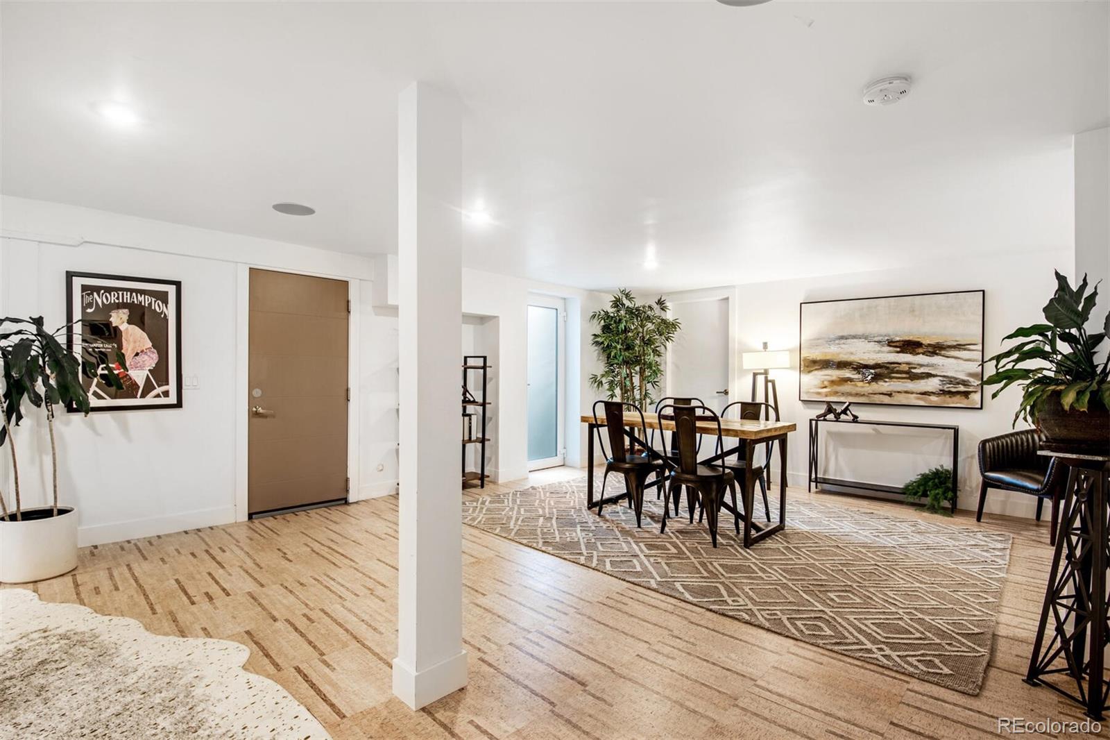 500 Iris Avenue Boulder, CO 80304 - Photo 33 of 39 a view of a dining room with furniture and wooden floor
