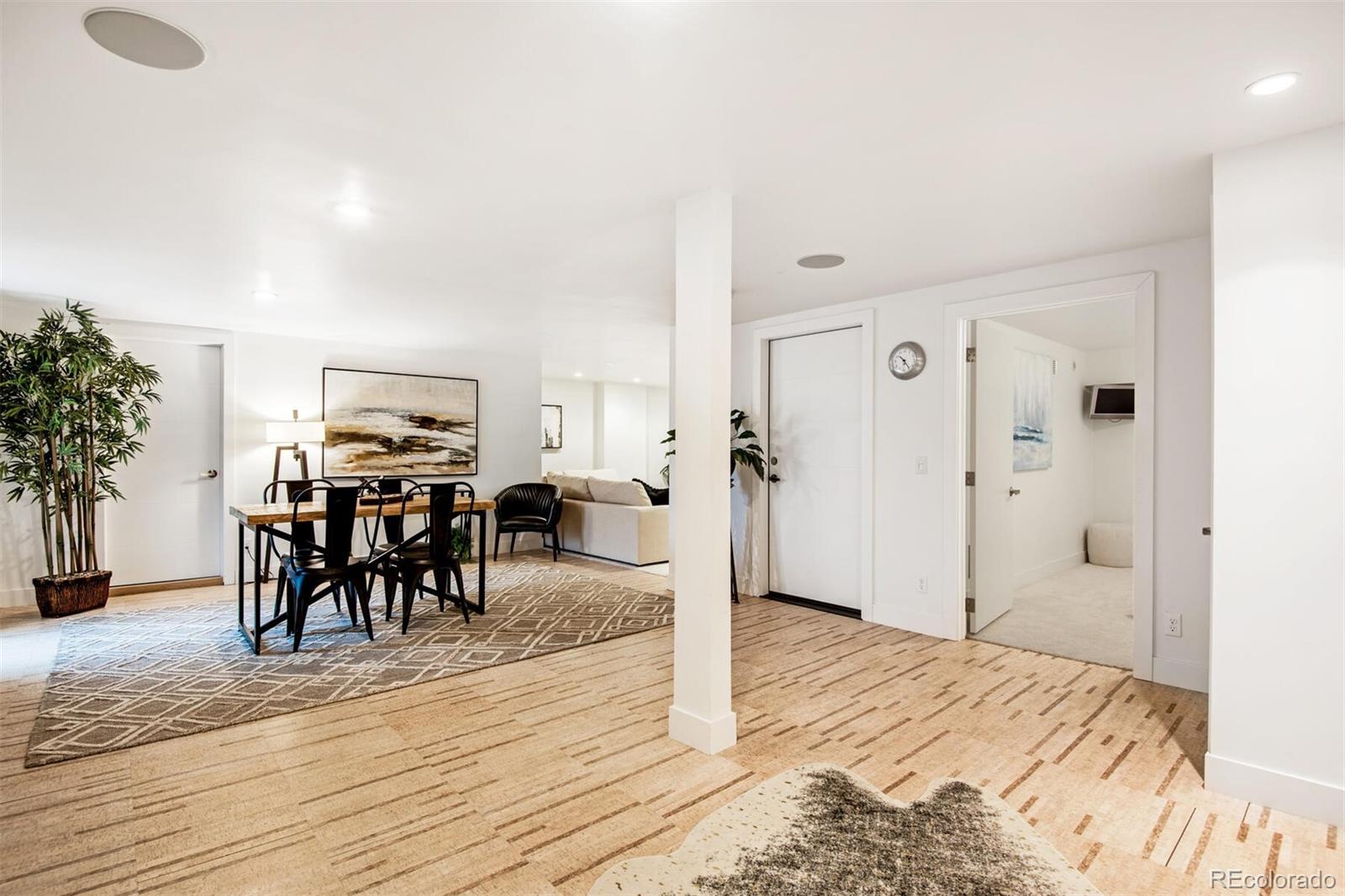 500 Iris Avenue Boulder, CO 80304 - Photo 34 of 39 a view of a room with furniture and wooden floor