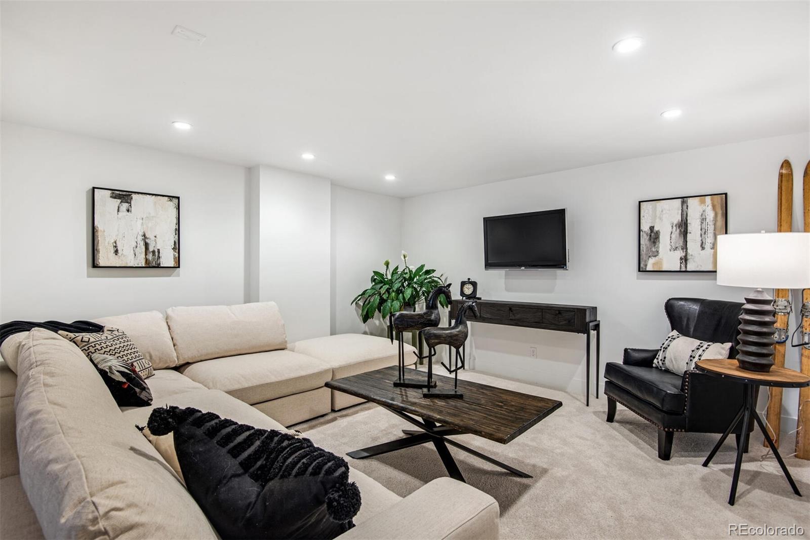 500 Iris Avenue Boulder, CO 80304 - Photo 35 of 39 a living room with furniture and a flat screen tv