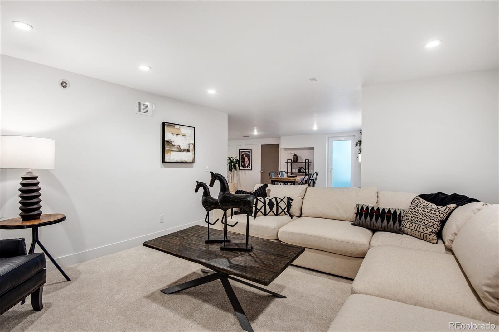 500 Iris Avenue Boulder, CO 80304 - Photo 36 of 39 a living room with furniture and a rug