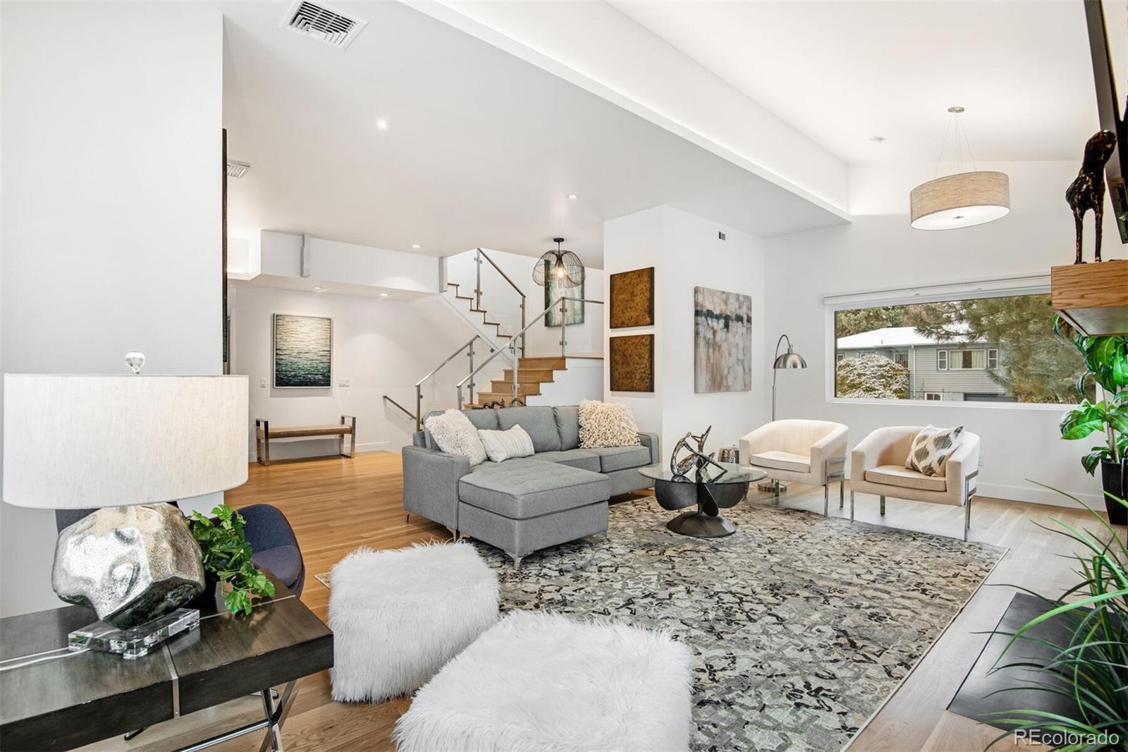 500 Iris Avenue Boulder, CO 80304 - Photo 9 of 39 a living room with furniture and wooden floor