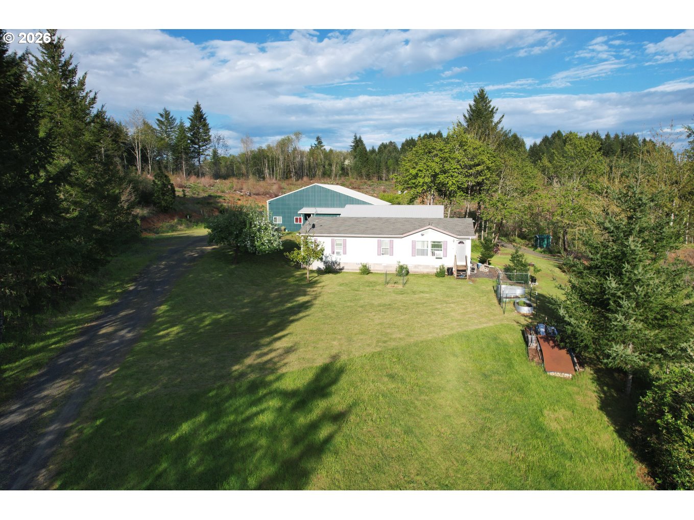 42255 Ames Creek Road Sweet Home, OR 97386 - Photo 3 of 19 a view of a house with a yard
