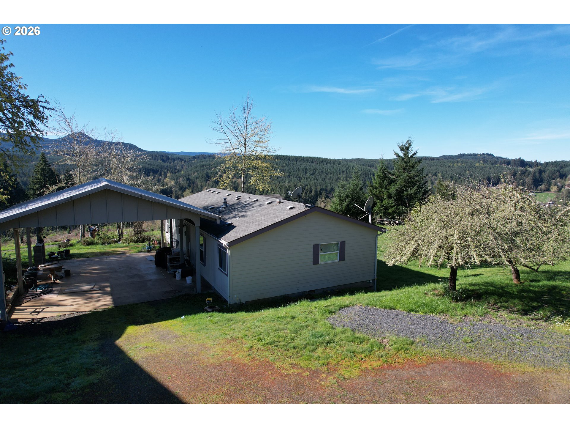 42255 Ames Creek Road Sweet Home, OR 97386 - Photo 4 of 19 a view of a house with a yard