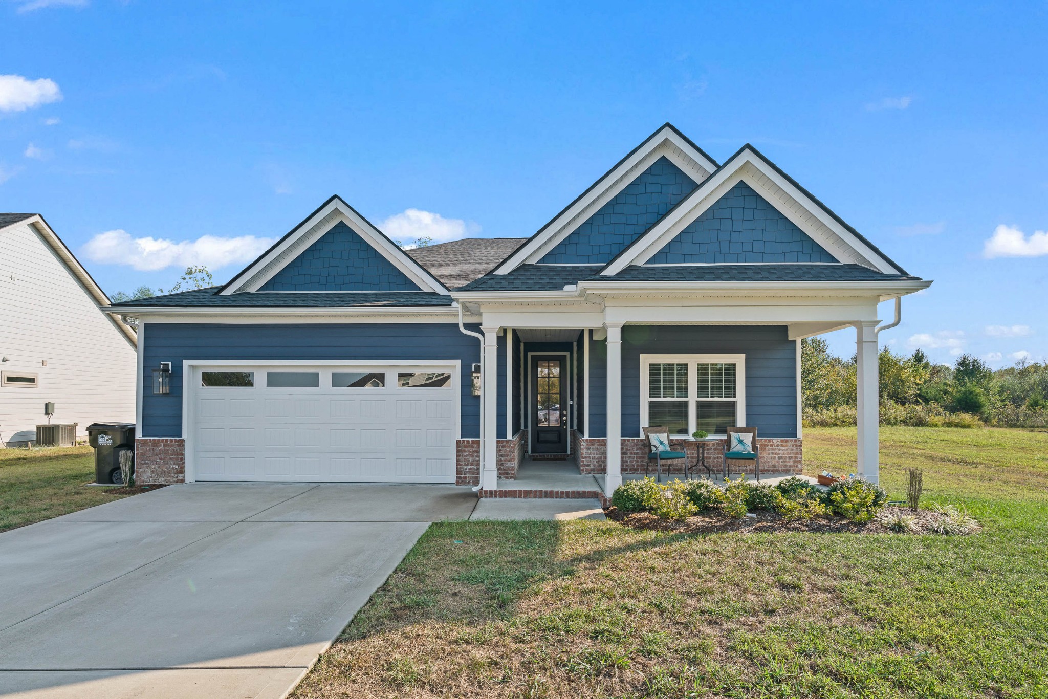 a front view of a house with a yard