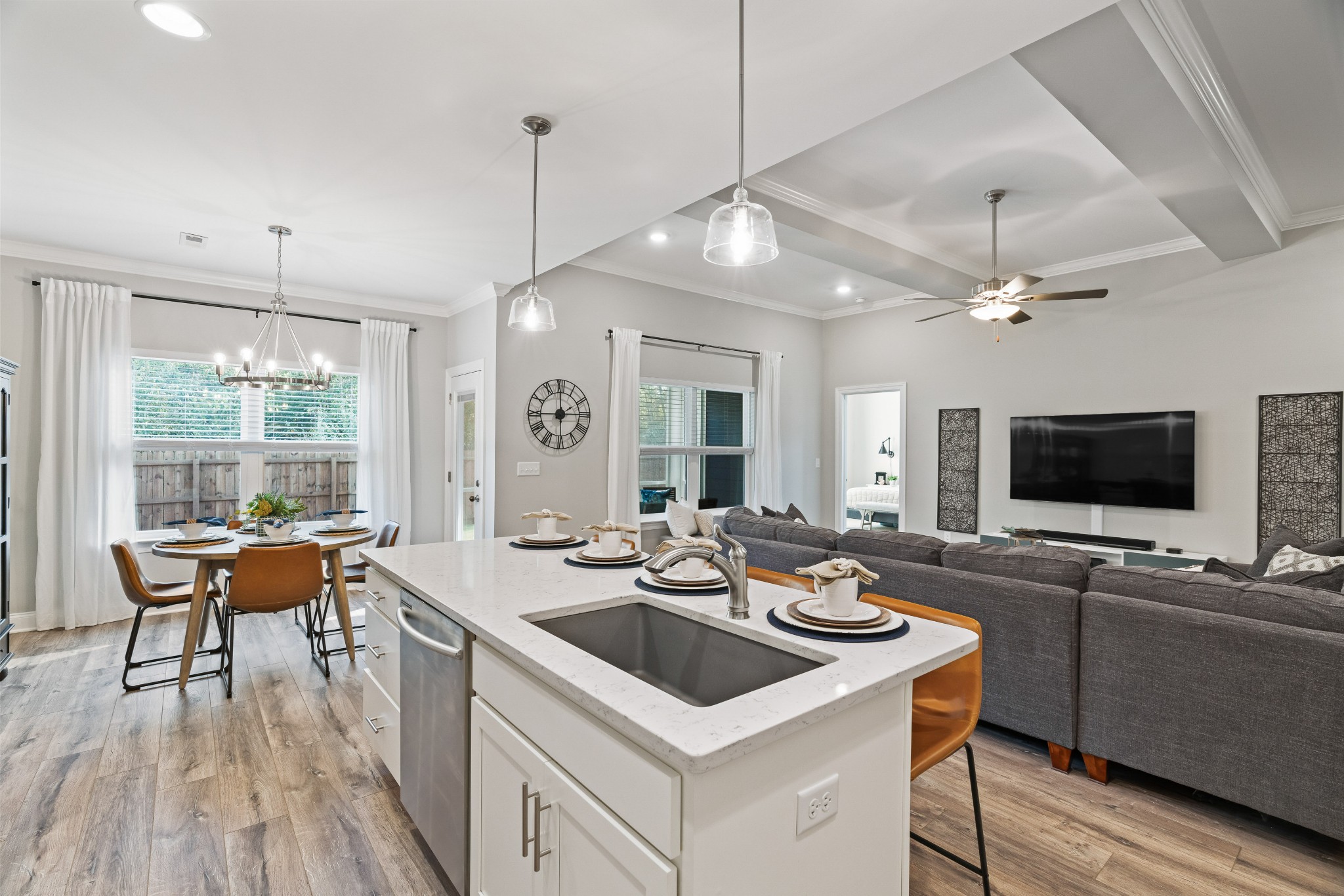 623 Gallant Way Murfreesboro, TN 37129 - Photo 21 of 48 a kitchen with a stove a sink dishwasher a dining table and chairs with wooden floor