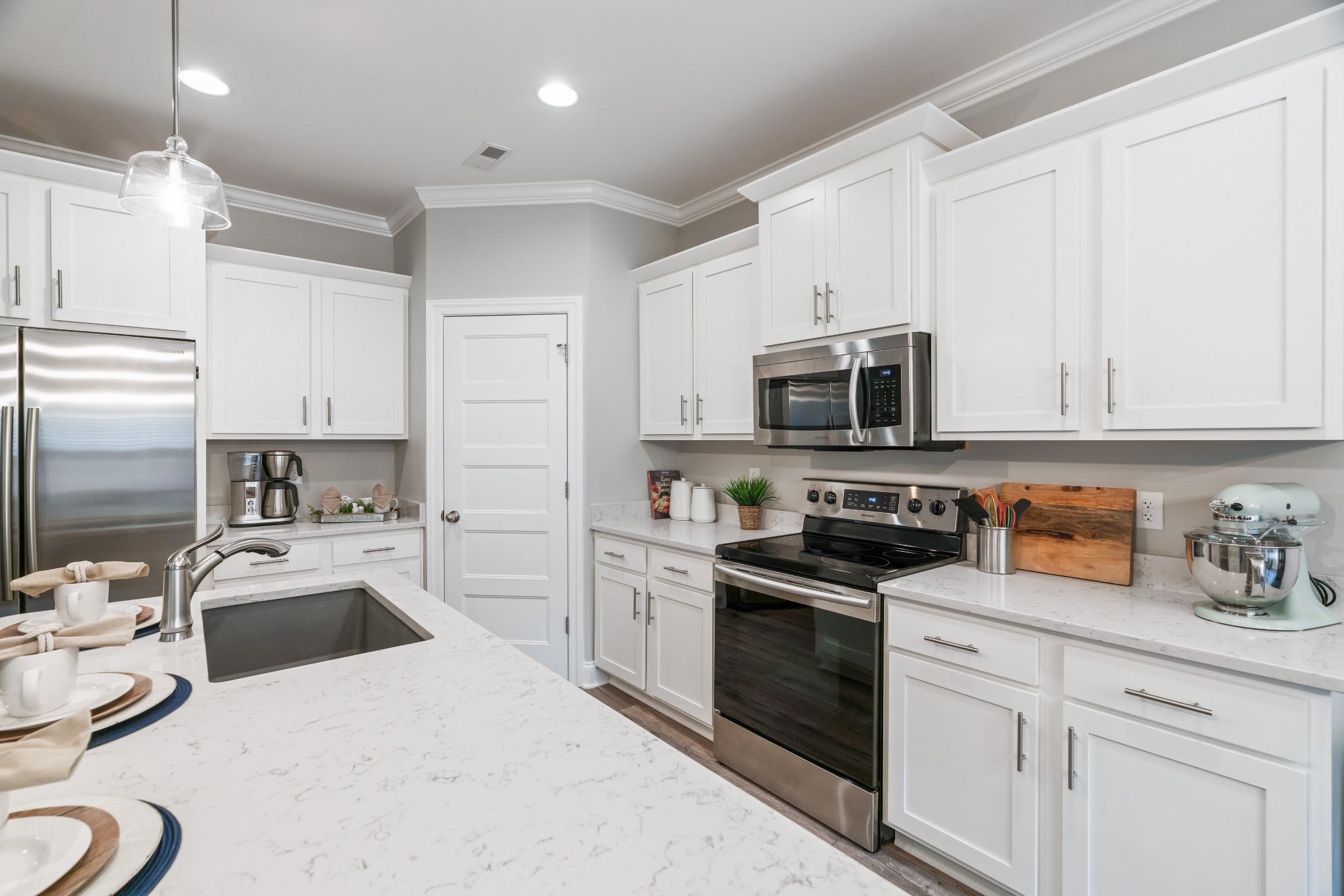623 Gallant Way Murfreesboro, TN 37129 - Photo 22 of 48 a kitchen with granite countertop a sink stainless steel appliances and white cabinets