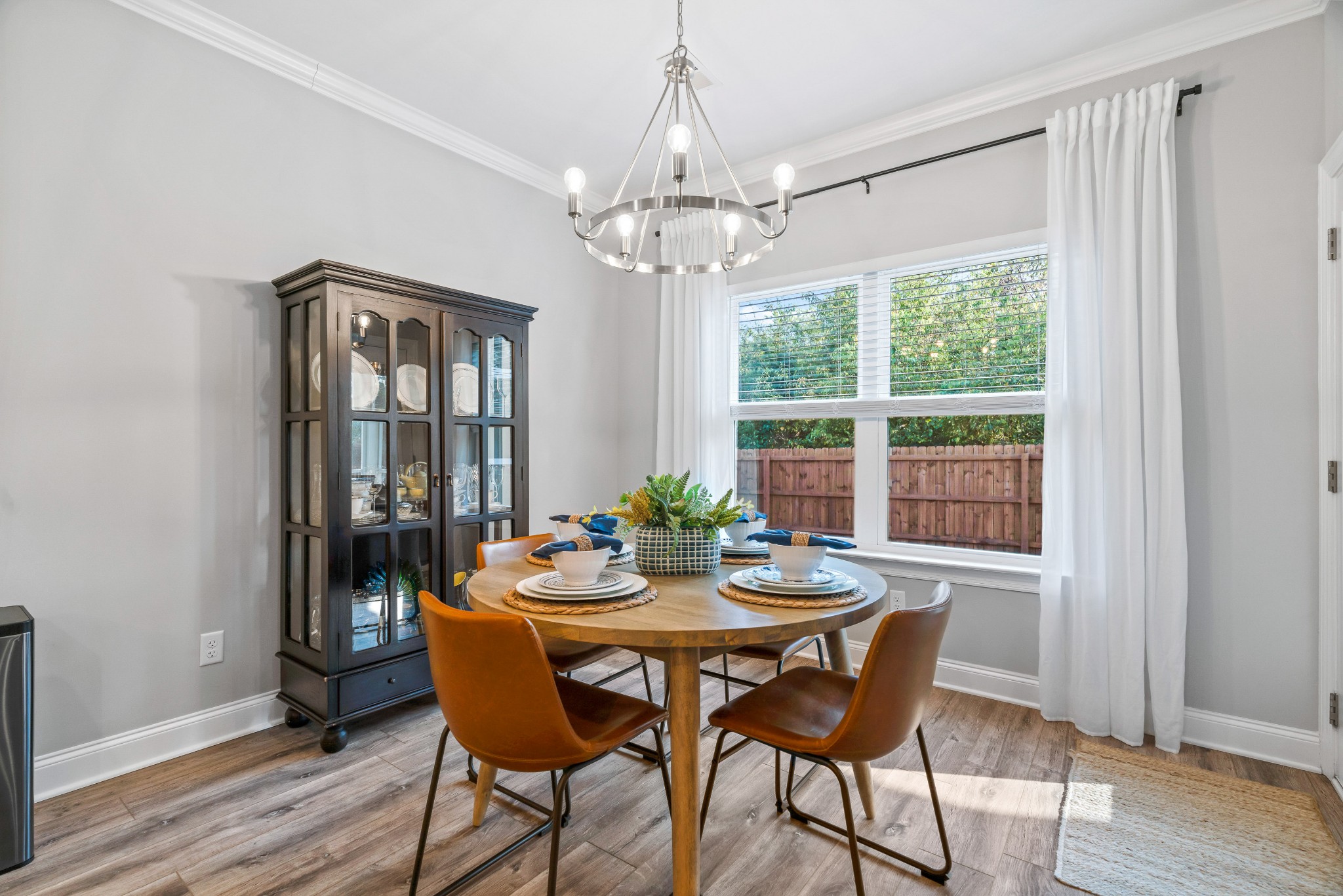 623 Gallant Way Murfreesboro, TN 37129 - Photo 23 of 48 a dining room with furniture a chandelier and wooden floor