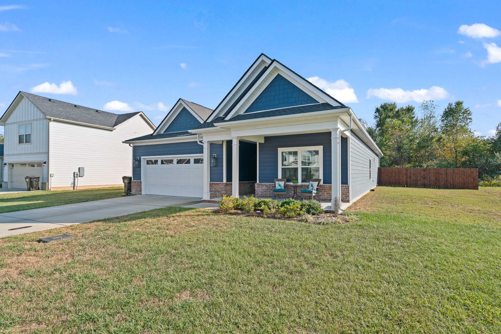 623 Gallant Way Murfreesboro, TN 37129 - Photo 3 of 48 a front view of a house with a garden