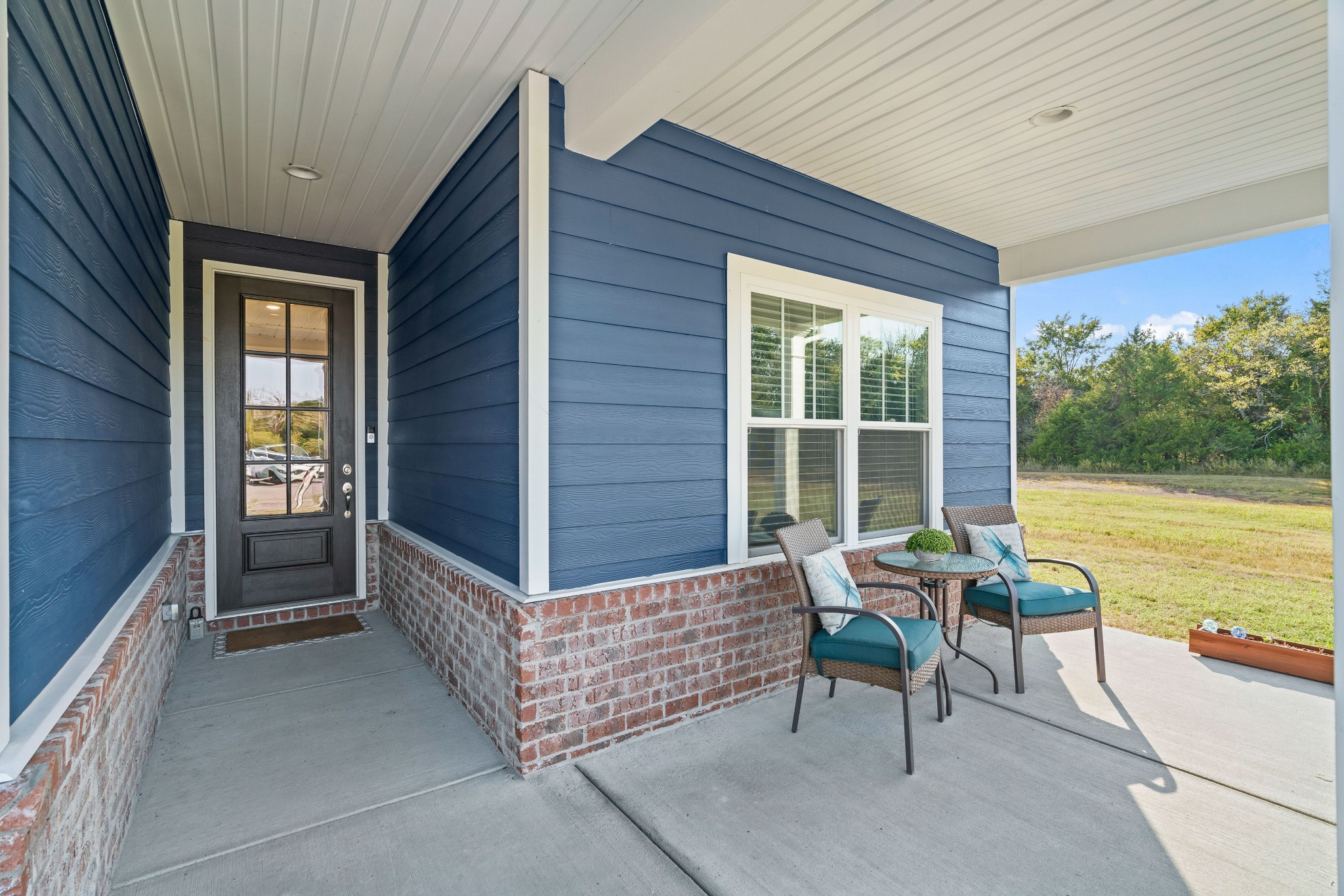 623 Gallant Way Murfreesboro, TN 37129 - Photo 4 of 48 a balcony with furniture and a yard