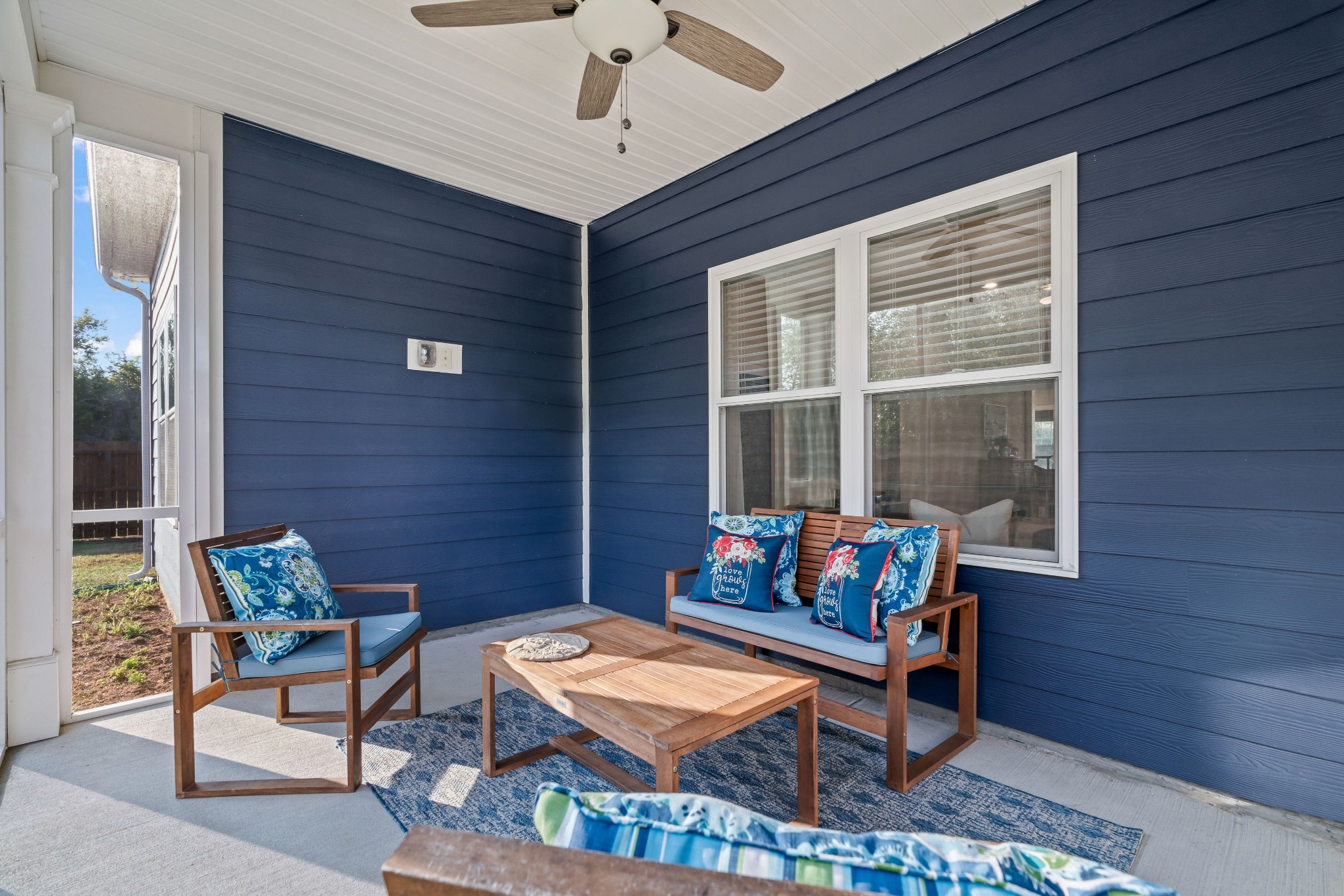 623 Gallant Way Murfreesboro, TN 37129 - Photo 44 of 48 a outdoor living space with furniture and a potted plant