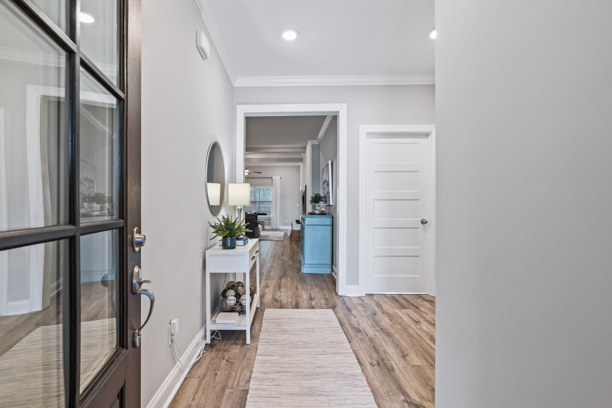 623 Gallant Way Murfreesboro, TN 37129 - Photo 5 of 48 a view of a hallway with furniture and a potted plant