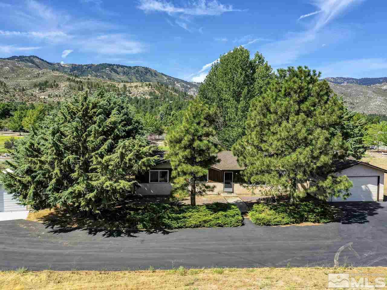 7465 Franktown Road Carson City, NV 89704 - Photo 1 of 25 a view of a house with a yard