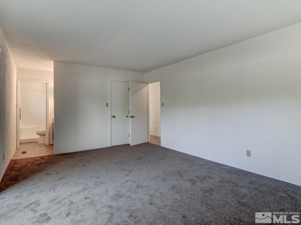 7465 Franktown Road Carson City, NV 89704 - Photo 18 of 25 an empty room with a natural light