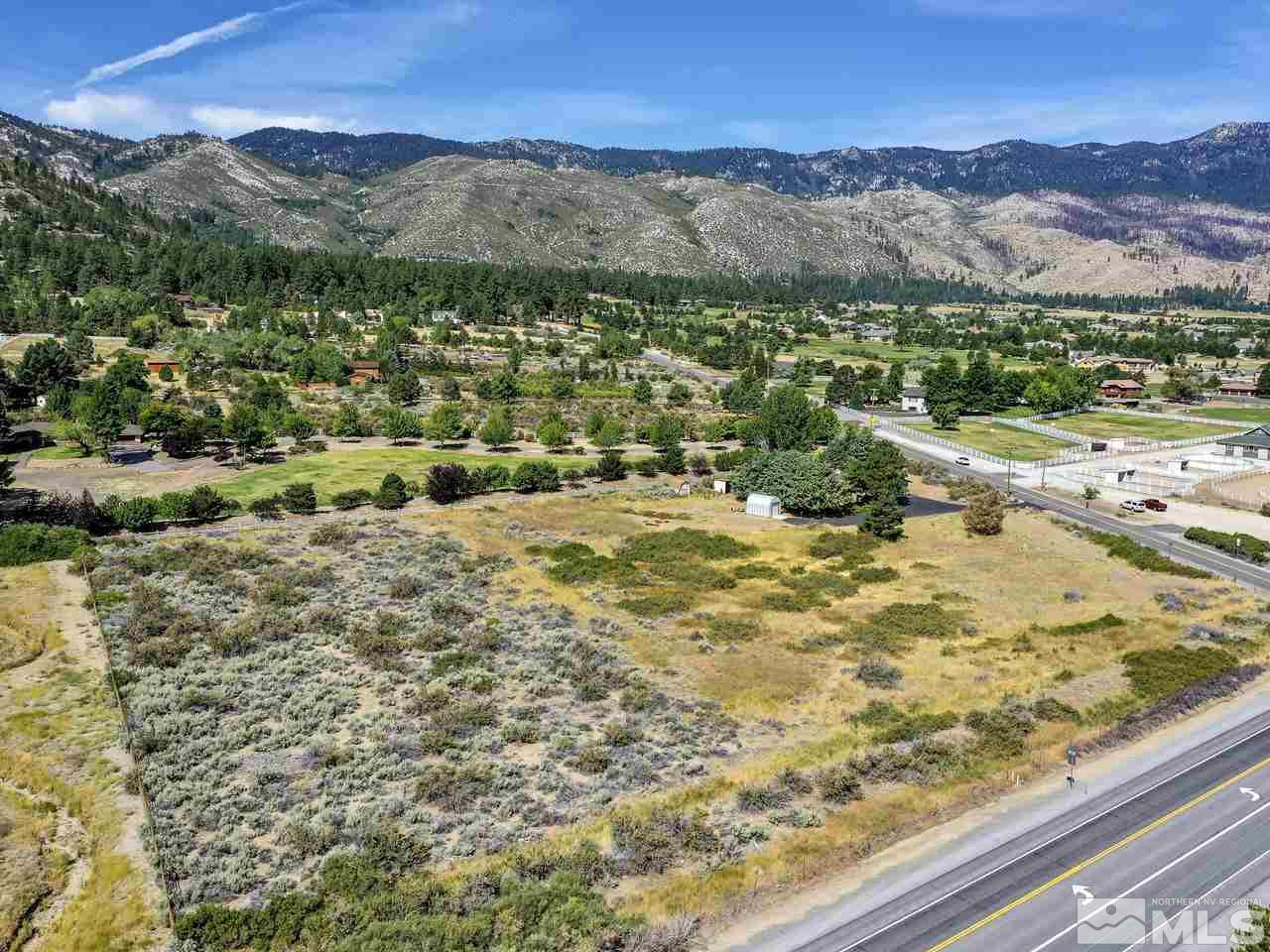 7465 Franktown Road Carson City, NV 89704 - Photo 25 of 25 a view of a lush green hillside and houses