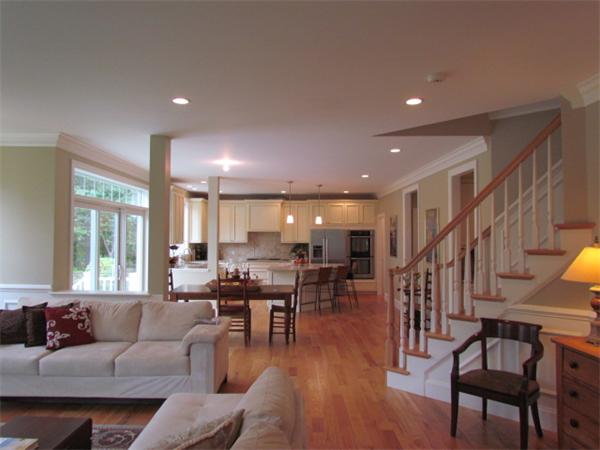 72 Richdale Road Needham, MA 02494 - Photo 4 of 10 a living room with lots of furniture and a dining table with wooden floor