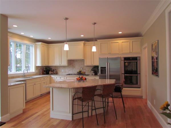 72 Richdale Road Needham, MA 02494 - Photo 5 of 10 a kitchen with a center island appliances and cabinets