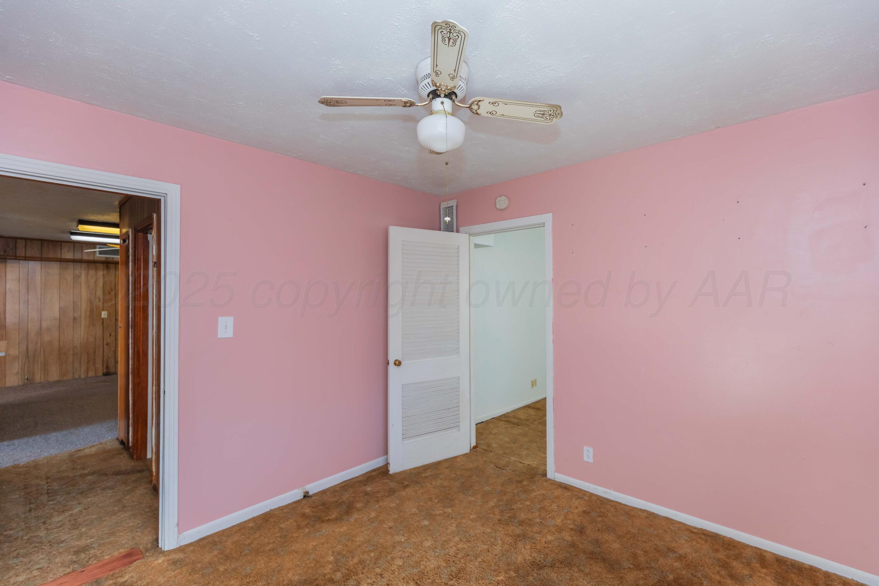 1808 Orange Street Amarillo, TX 79107 - Photo 18 of 38 a view of a livingroom with a chandelier fan
