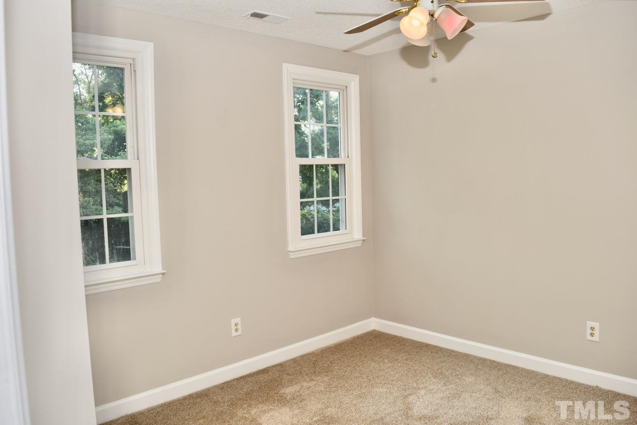6233 Jones Farm Road Wake Forest, NC 27587 - Photo 16 of 23 Situated on the back of the home, this room overlooks the back yard and deck below.