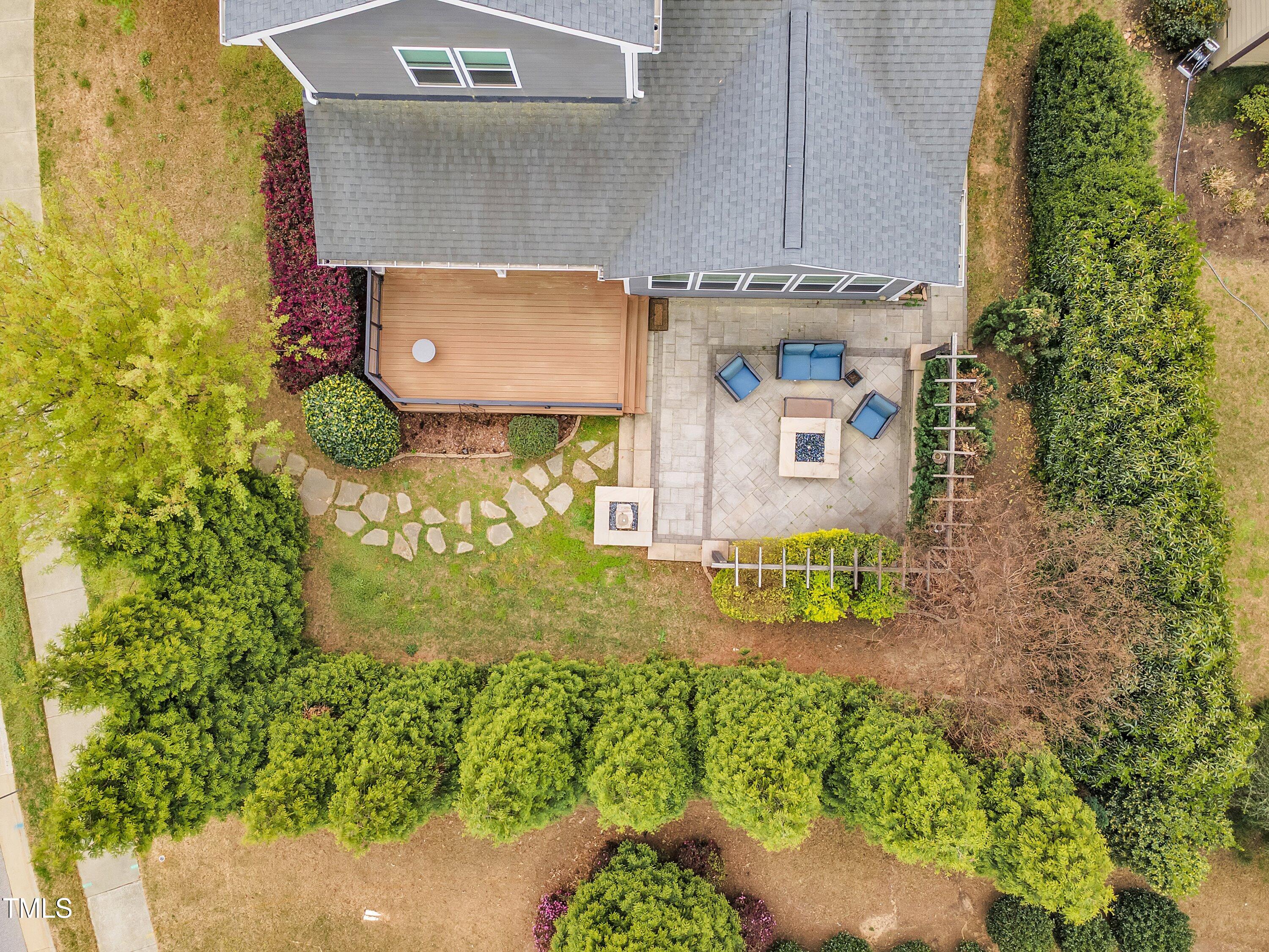 8121 Greys Landing Way Raleigh, NC 27615 - Photo 88 of 95 an aerial view of a house with a yard basket ball court and outdoor seating