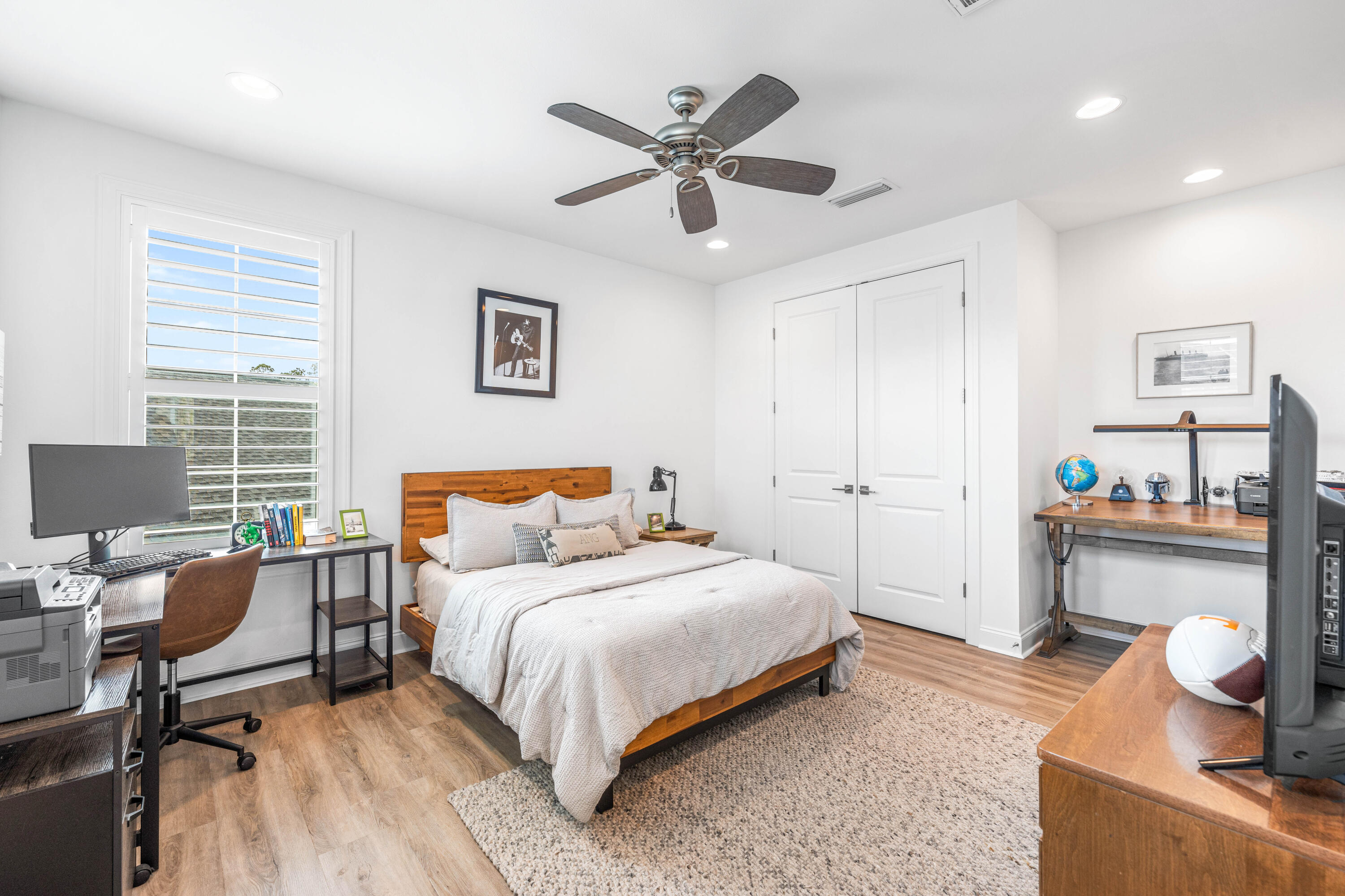 229 Windrow Way Inlet Beach Inlet Beach, FL 32461 - Photo 26 of 66 a bedroom with a bed and a chandelier