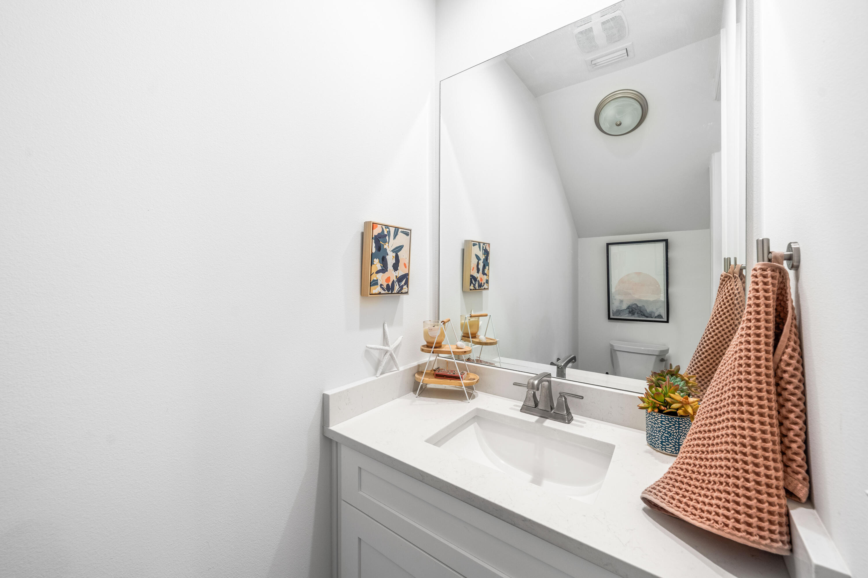 229 Windrow Way Inlet Beach Inlet Beach, FL 32461 - Photo 6 of 66 a bathroom with a sink and a mirror