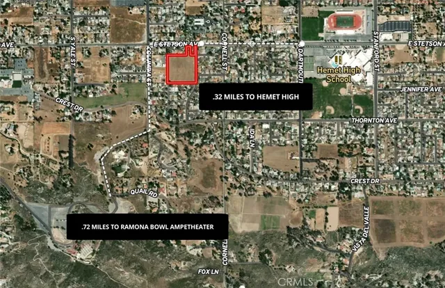 an aerial view of a house with a ocean view