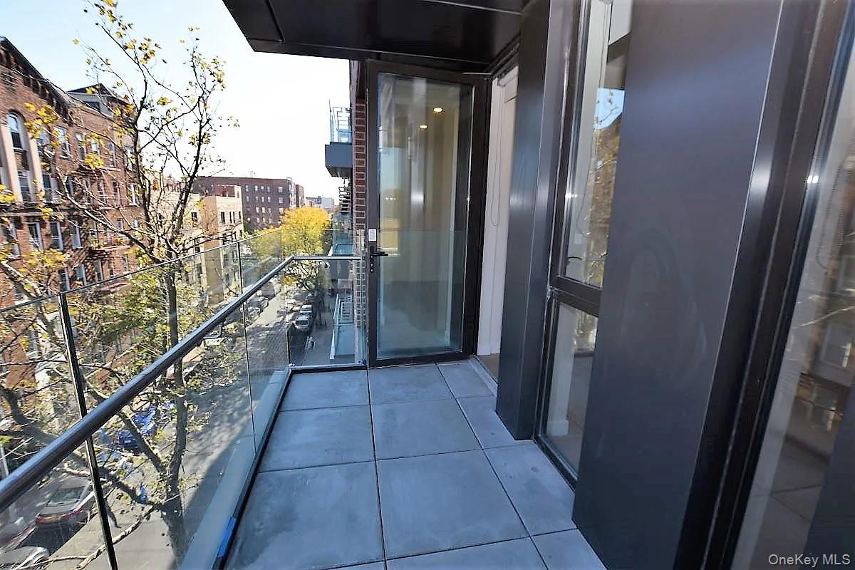 41-26 44th Street, Unit 3C Queens, NY 11104 - Photo 13 of 26 Balcony featuring a city view