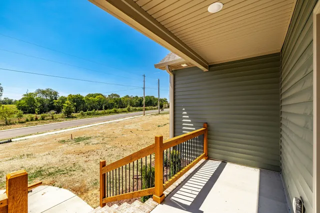 a view of a kitchen with a sink and a stove top oven