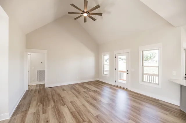 a stove top oven sitting inside of a kitchen