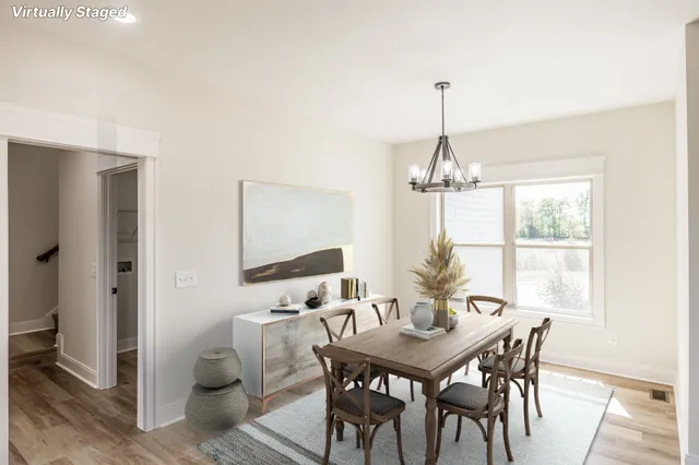 a bathroom with a double vanity sink mirror and shower