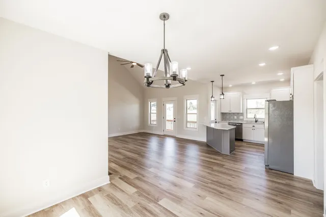 a bathroom with a sink and shower