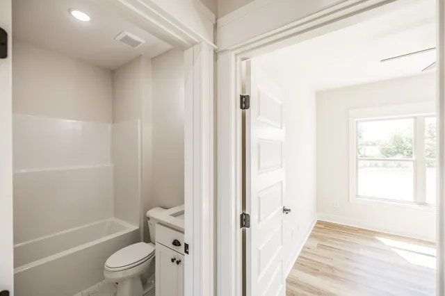 a view of a balcony with wooden floor and stairs