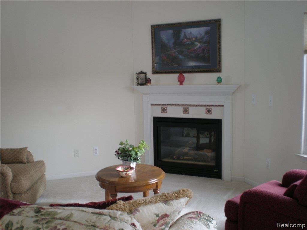 1219 Crystal Pointe Circle, Unit 48 Fenton, MI 48430 - Photo 8 of 25 Great Rm 1