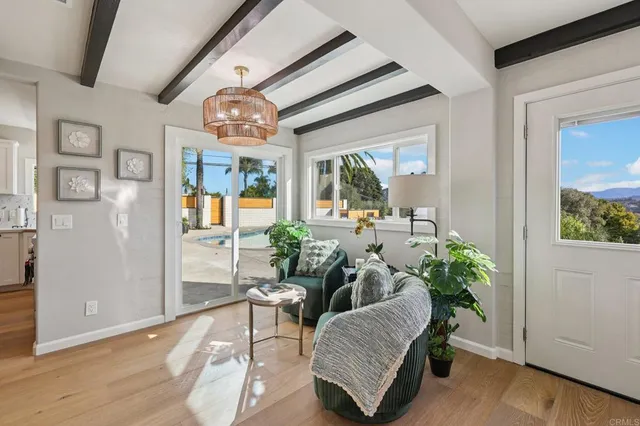 a living room with furniture and a window