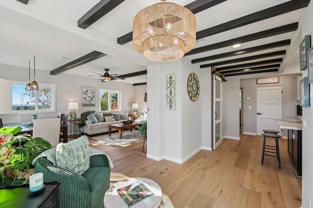 a view of a dining room with furniture window and outside view