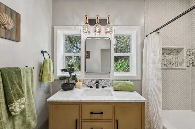 a spacious bedroom with a bed and a table