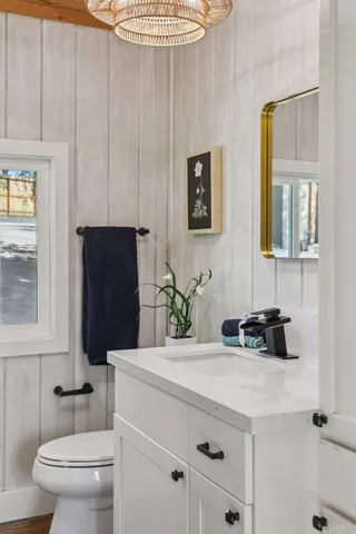 a view of a house with swimming pool and sitting area
