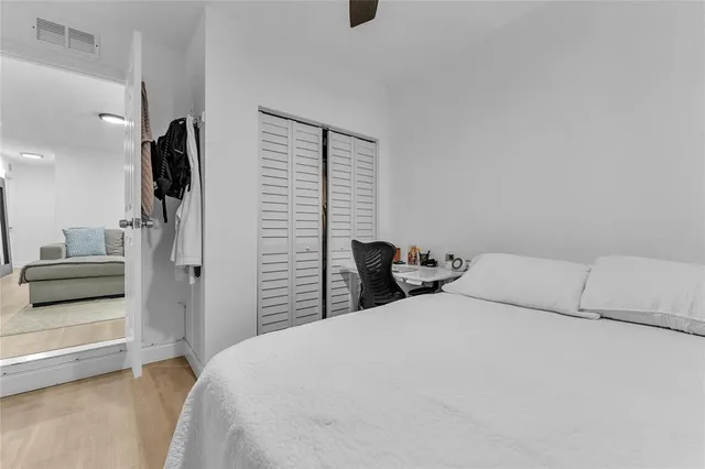 a workspace with furniture and wooden floor