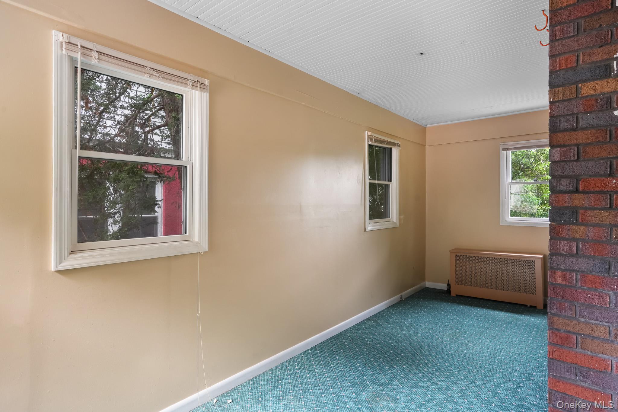 211 Pomeroy Street Peekskill, NY 10566 - Photo 11 of 50 Bonus room behind living room accessible from dining room
