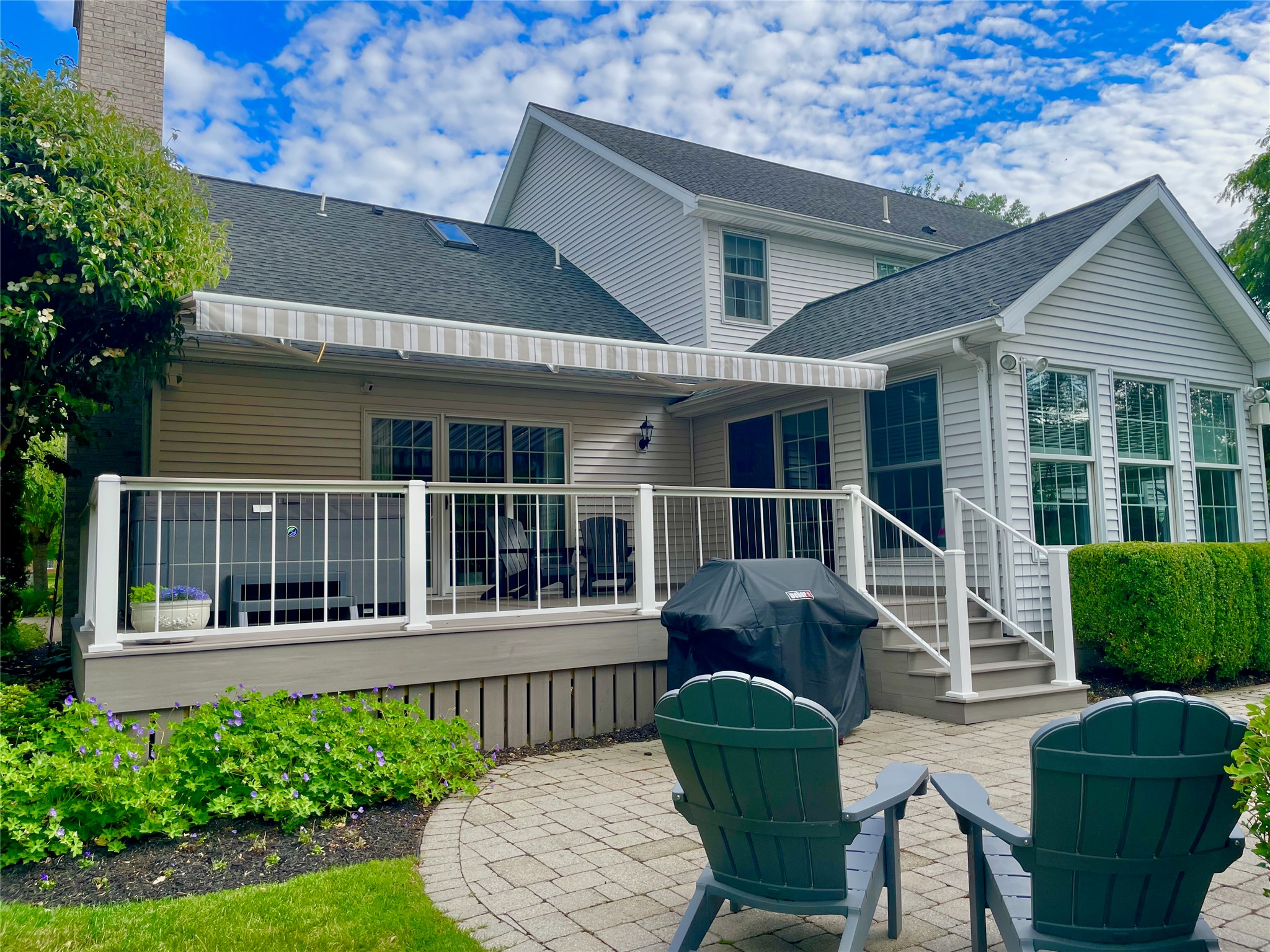 6620 Manchester Farms Road Fairview, PA 16415 - Photo 32 of 36 Push button retractable awning allows you to enjoy the sun or shade
