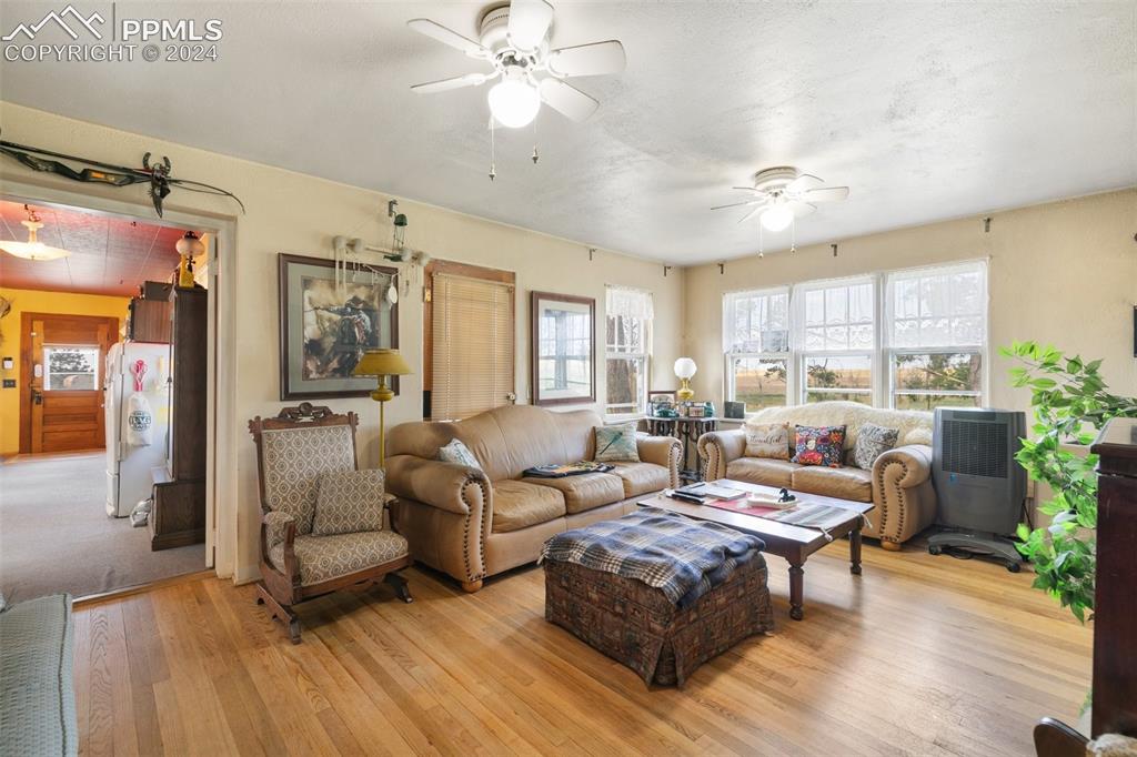 40150 Rapp Road Rush, CO 80833 - Photo 22 of 39 a living room with furniture and a large window
