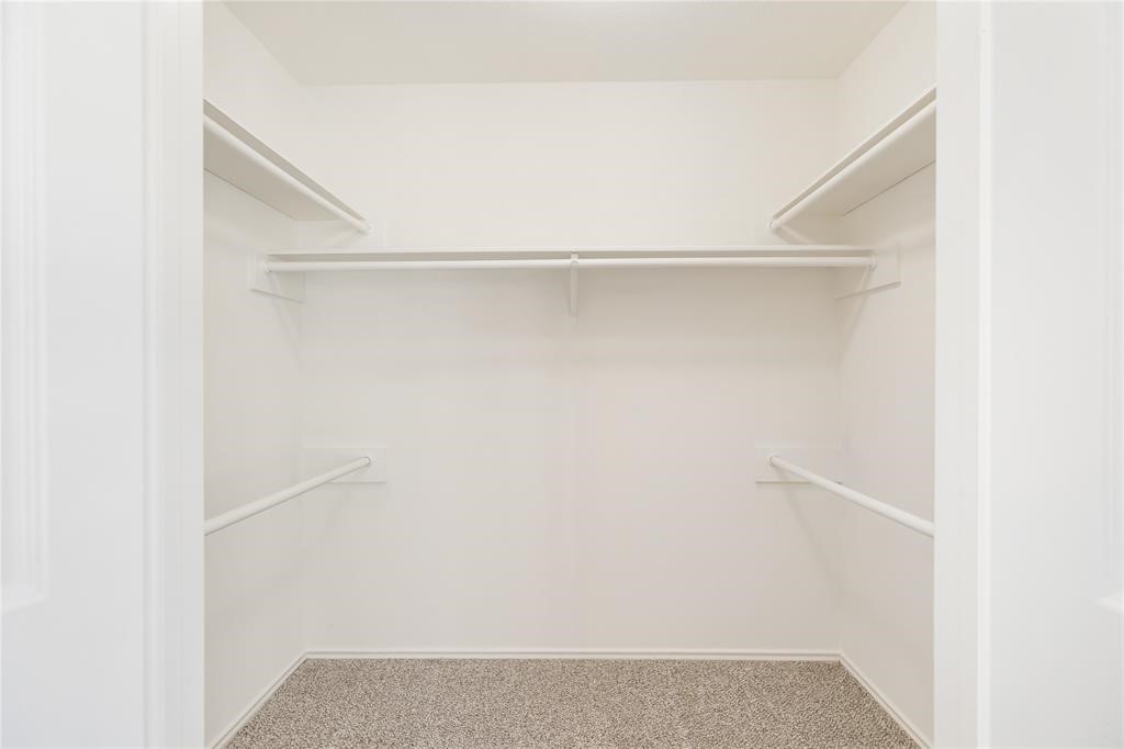 9410 Calwood Circle Spring, TX 77379 - Photo 24 of 34 a view of an empty walk in closet